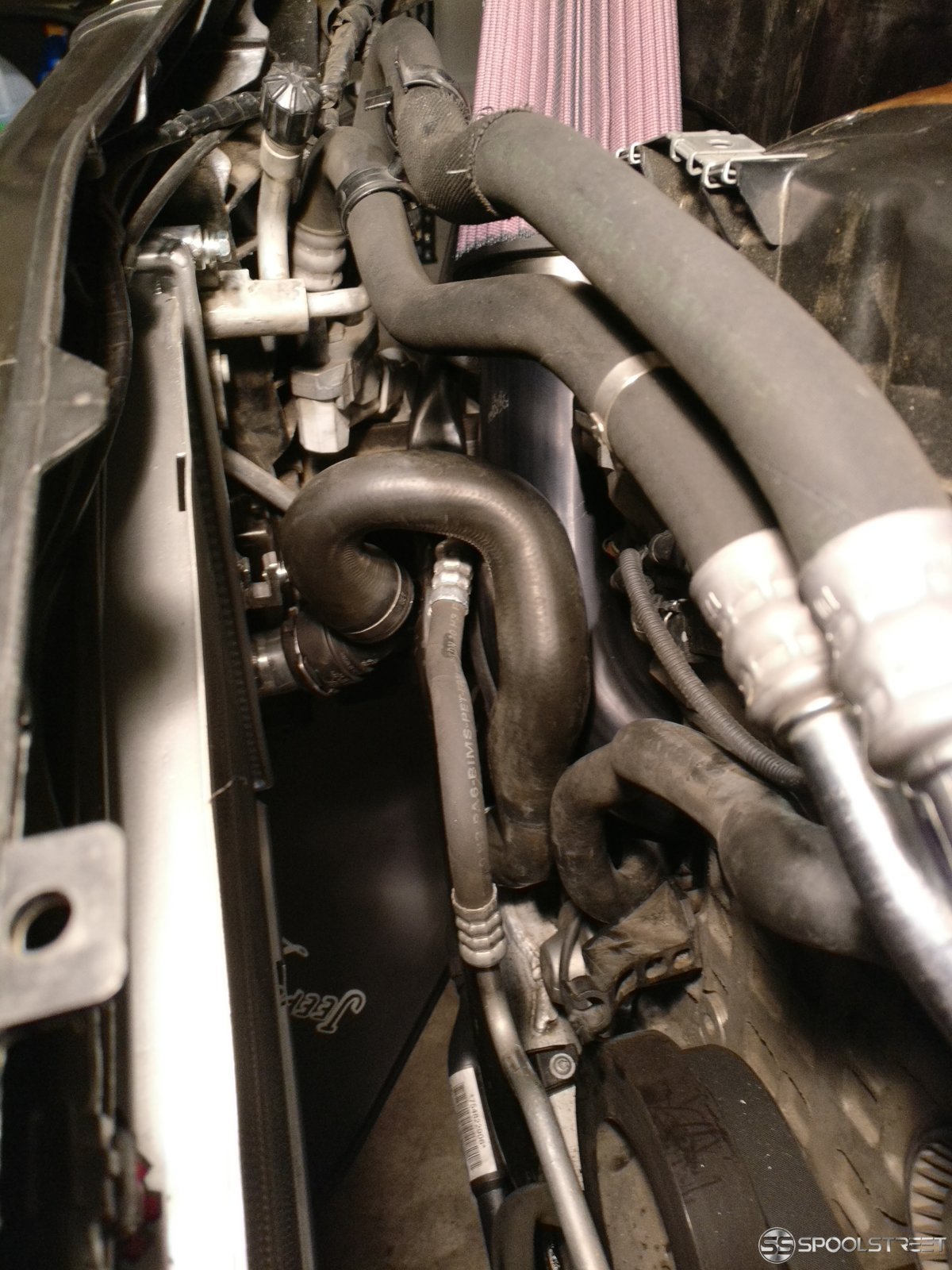 Head bypass and lower radiator hose