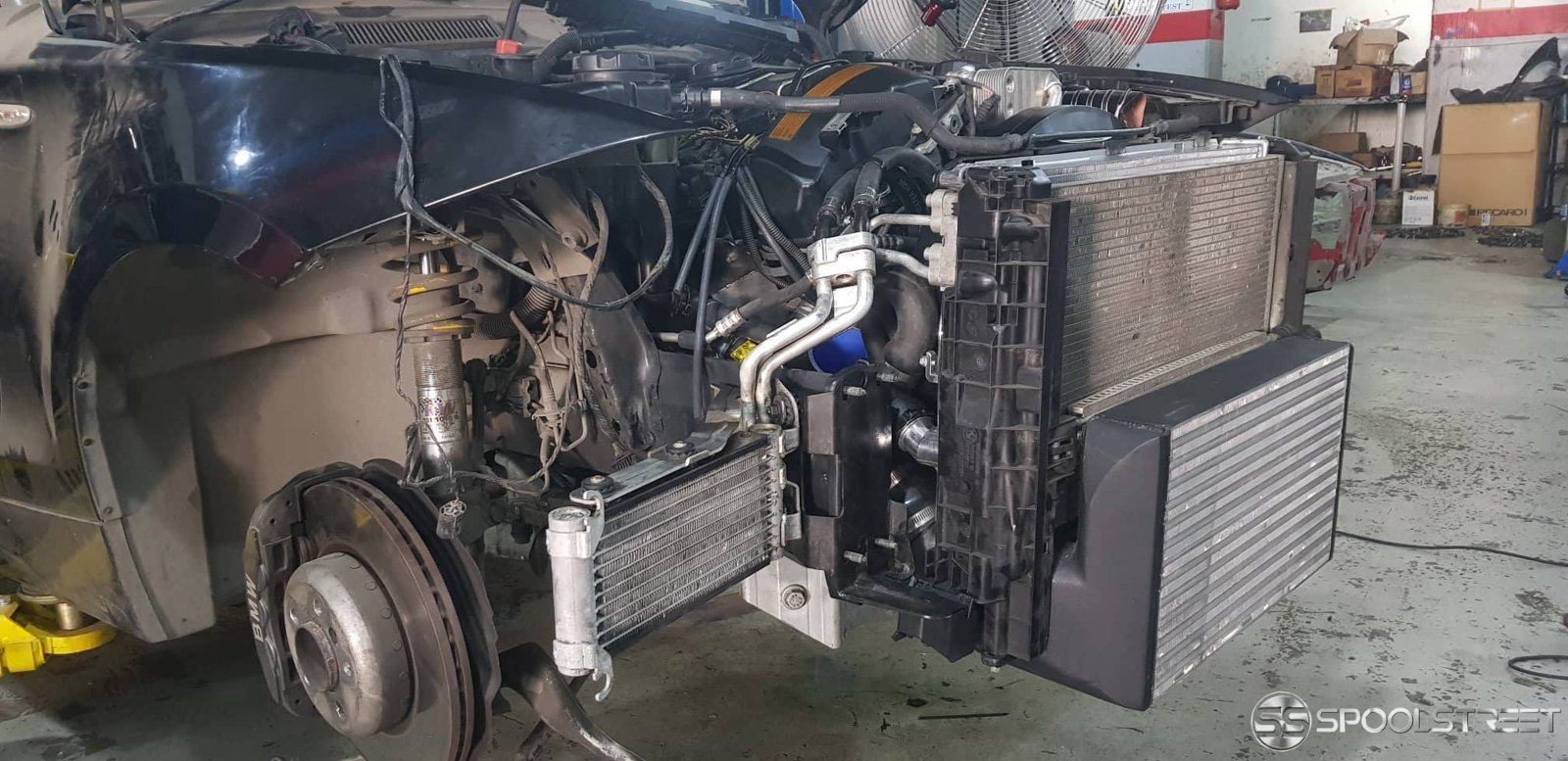 Oil cooler re-purposed as auxiliary radiator